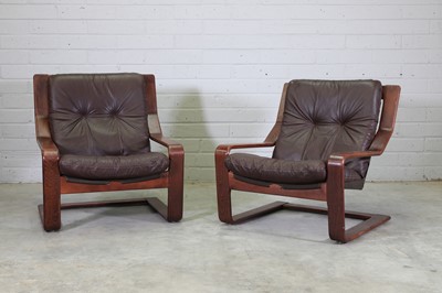 Lot 370 - A pair of Danish stained beech cantilever armchairs