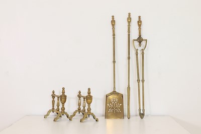 Lot 456 - A set of brass fire tools