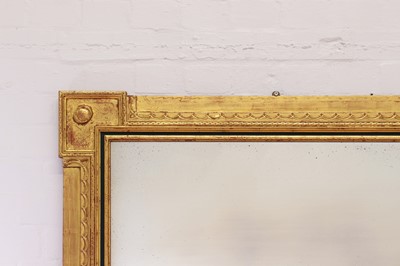 Lot 95 - A pair of giltwood and ebonised mirrors