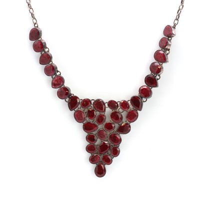 Lot 67 - A silver and opaque ruby bib style  necklace