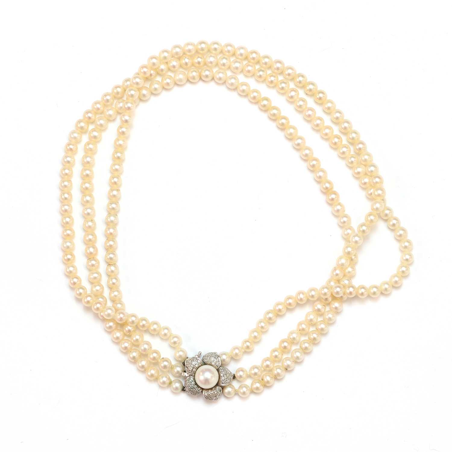 Lot 155 - A three row uniform cultured pearl necklace