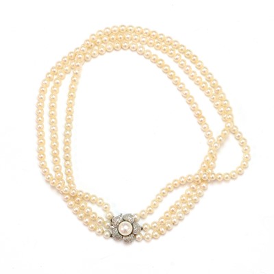 Lot 155 - A three row uniform cultured pearl necklace