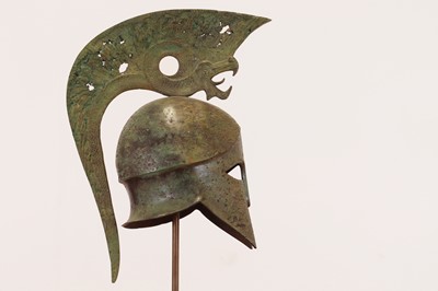 Lot 574 - A bronze helmet of Corinthian type