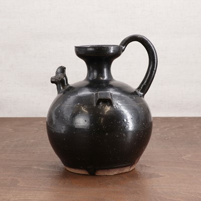 Lot 4 - A Chinese black-glazed ewer