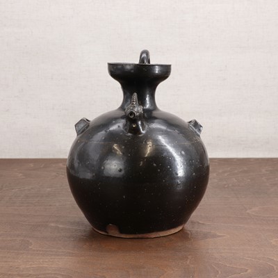 Lot 4 - A Chinese black-glazed ewer