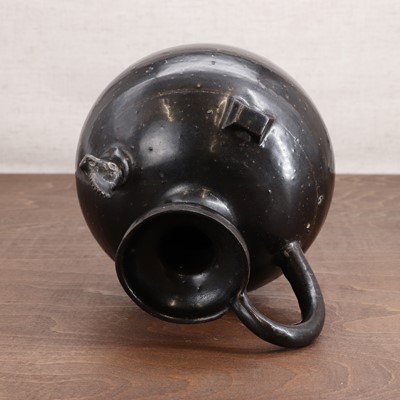 Lot 4 - A Chinese black-glazed ewer