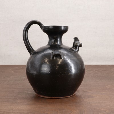 Lot 4 - A Chinese black-glazed ewer