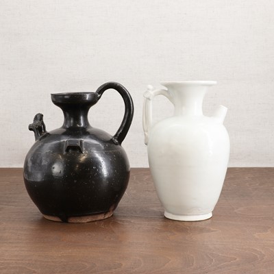 Lot 4 - A Chinese black-glazed ewer