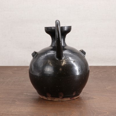 Lot 4 - A Chinese black-glazed ewer