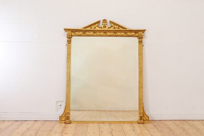 Lot 33 - A George III-style carved giltwood and gesso overmantel mirror