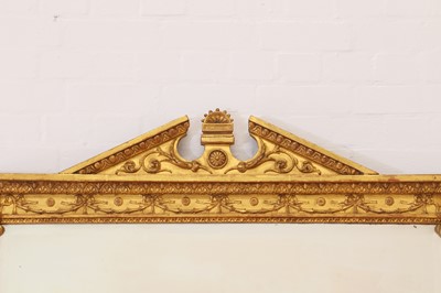 Lot 33 - A George III-style carved giltwood and gesso overmantel mirror