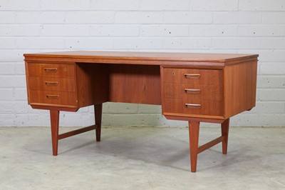 Lot 412 - A Danish double-sided teak desk