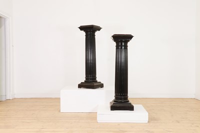 Lot 338 - A pair of ebonised wooden columns