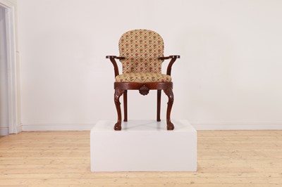 Lot 517 - An oak and beech open armchair