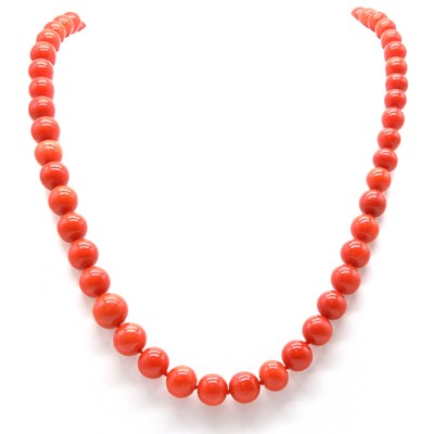 Lot 310 - A single row graduated coral bead necklace