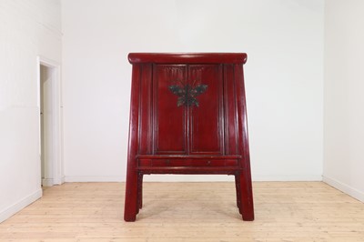 Lot 347 - A Chinese red-lacquered marriage cabinet