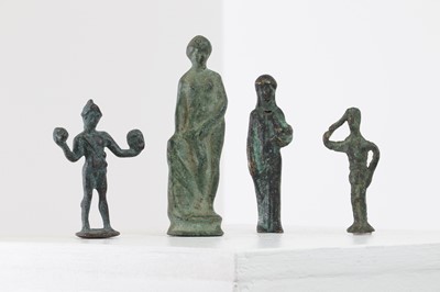 Lot 184 - A group of small grand tour bronze figures after the antique