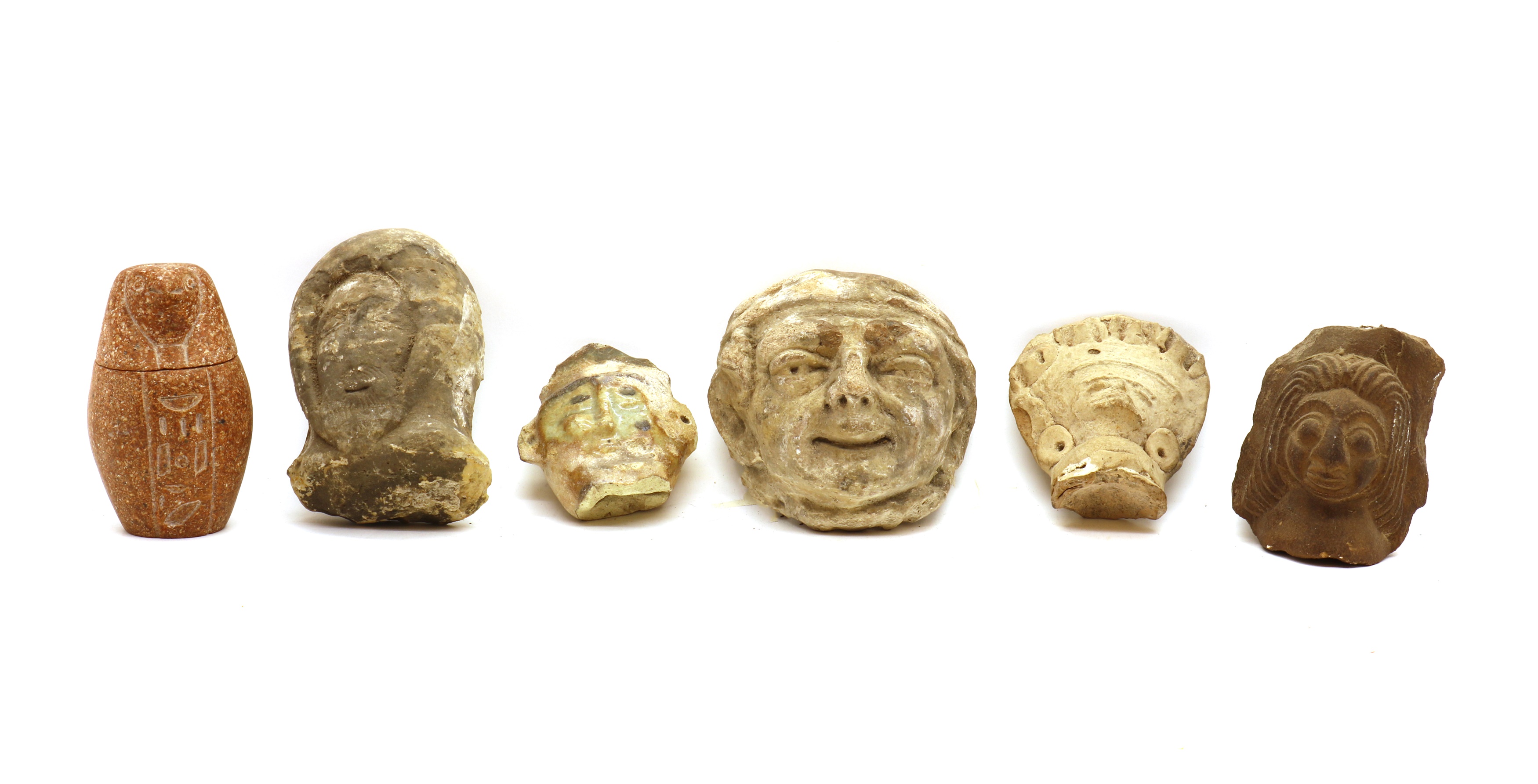 Lot 192 - A group of South American grotesque masks,