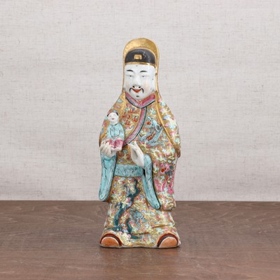 Lot 130 - A Chinese famille rose figure