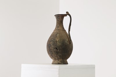 Lot 551 - An Islamic bronze ewer