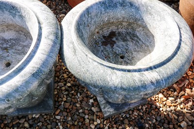 Lot 455 - A pair of granite garden urns