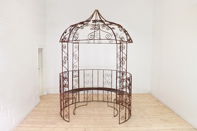 Lot 688 - A Victorian-style wrought-iron garden gazebo