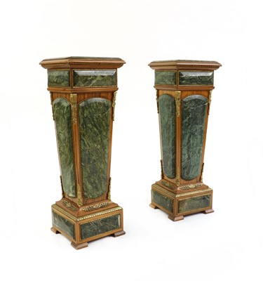 Lot 481 - A pair of Louis XVI-style green marble and walnut pedestals