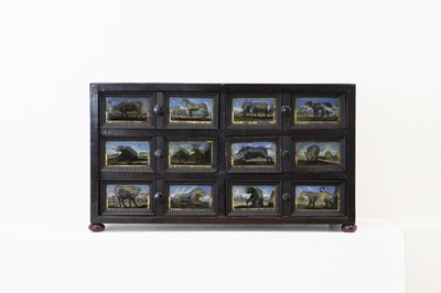 Lot 391 - A baroque walnut, ebonised and verre églomisé table cabinet