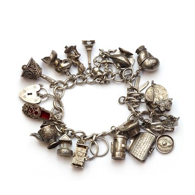 Lot 178 - A silver charm bracelet