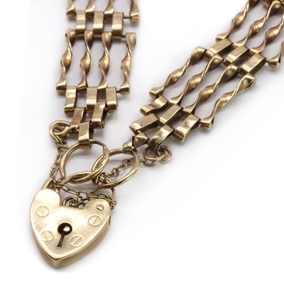 Lot 175 - A 9ct gold four row gate bracelet