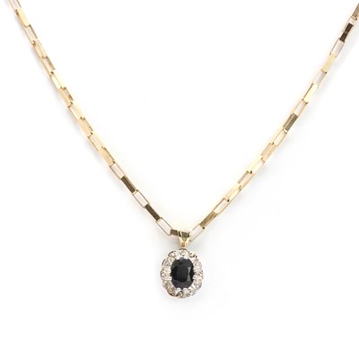 Lot 108 - A 9ct gold sapphire and diamond pendant