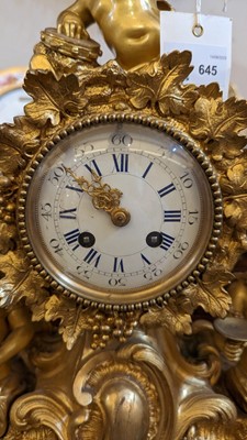 Lot 645 - A gilt-bronze mantel clock