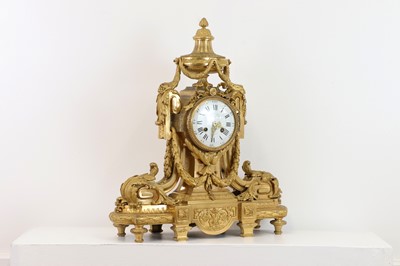 Lot 617 - An Empire-style ormolu mantel clock