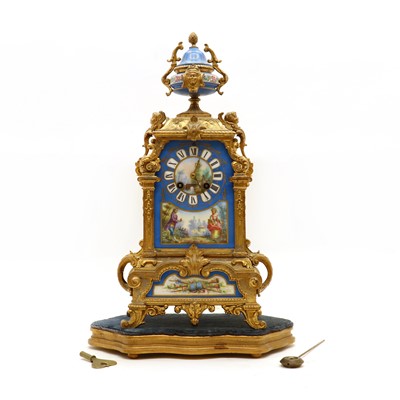 Lot 152 - A gilt spelter and porcelain mantel clock and stand