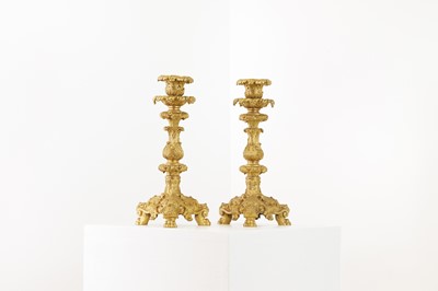 Lot 651 - A pair of gilt-bronze candlesticks