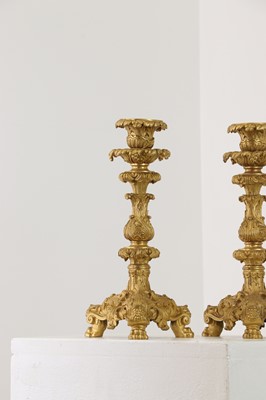 Lot 651 - A pair of gilt-bronze candlesticks
