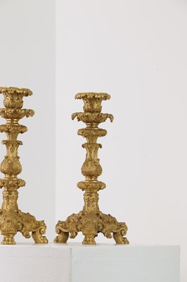 Lot 651 - A pair of gilt-bronze candlesticks