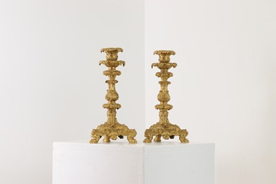 Lot 651 - A pair of gilt-bronze candlesticks