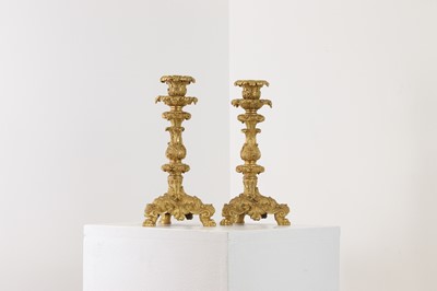 Lot 651 - A pair of gilt-bronze candlesticks