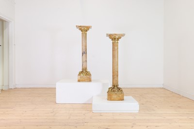 Lot 638 - A pair of giallo antico marble pedestals