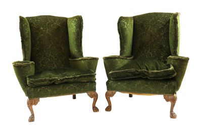 Lot 462 - A pair of large wingback armchairs