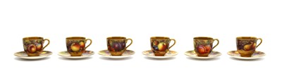 Lot 190A - A harlequin Royal Worcester fruit painted porcelain coffee set