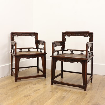 Lot 260 - A pair of Chinese huanghuali low-back rose chairs