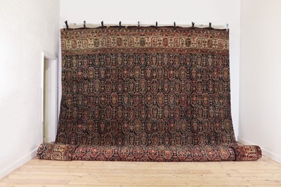 Lot 450 - A very large Persian wool carpet