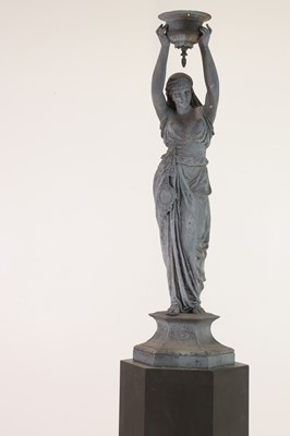 Lot 41 - A patinated spelter figure in the manner of Émile Guillemin