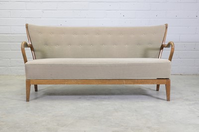 Lot 227 - A Danish Modern spindle-backed beech settee