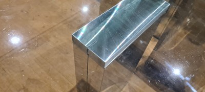 Lot 452 - A glass-topped coffee table