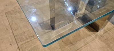Lot 452 - A glass-topped coffee table