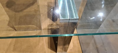 Lot 452 - A glass-topped coffee table
