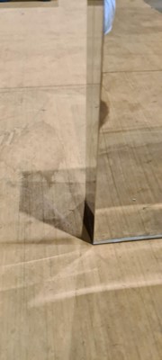 Lot 452 - A glass-topped coffee table